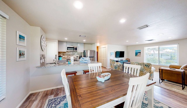 2nd-floor condo across the street from the beach with heated pool, balcony, W/D in Anna Maria