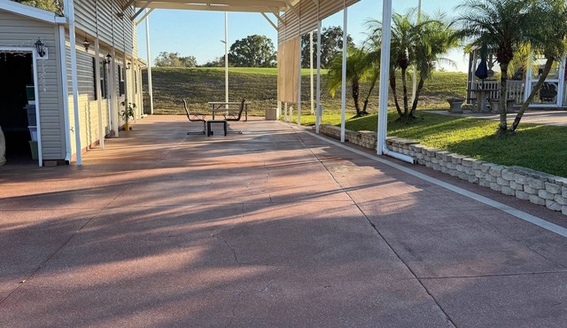 Class A RV pad in very active senior community with golf, pools, tennis, hottubs in Davenport