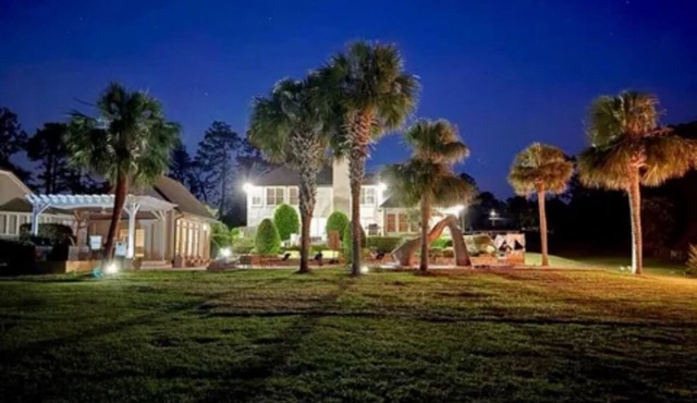 Resort style 5-bedroom lake house with white sand beach, pool, and pool house. in Douglas