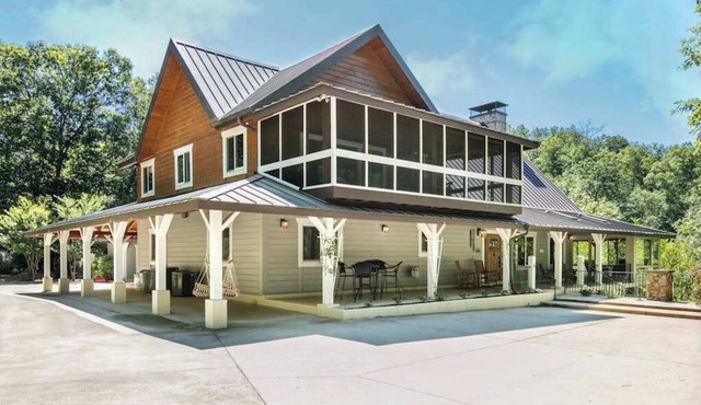 Riverside opulence with game room, private heated pool, hot tub & firepit in Rutherfordton
