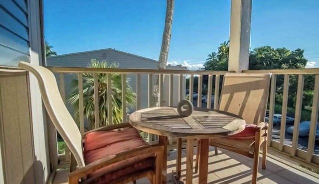 Stay Close to the Waves in an Ocean-View Family Condo with Pool in Kaunakakai